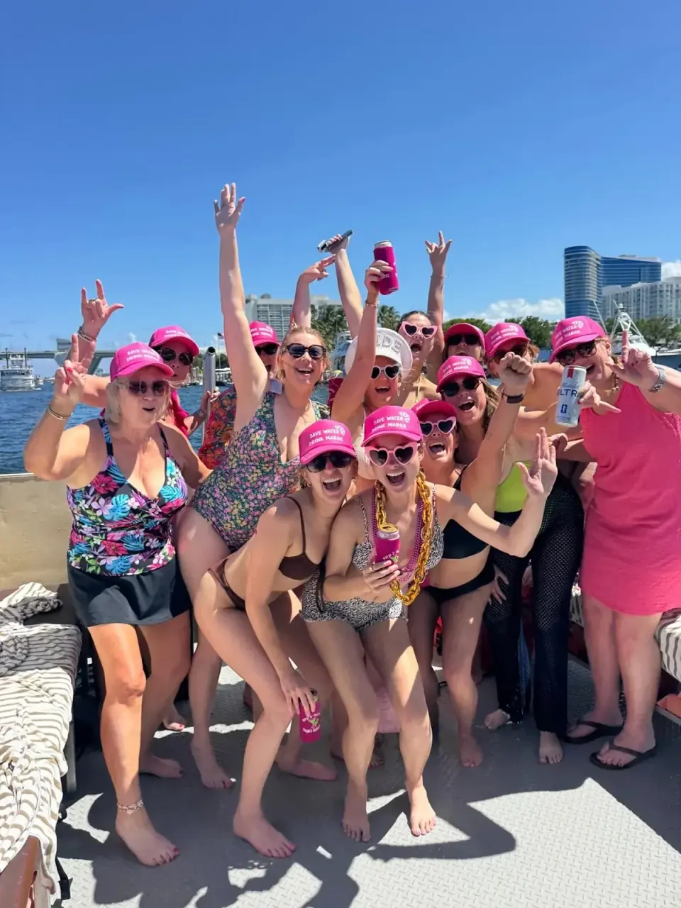 Bachelorette party group celebrating aboard Freaky Tiki in Fort Lauderdale